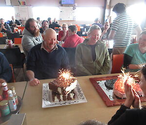 Helen Achurch and Joe Briguglio presented with birthday cakes at Davis