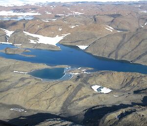 A birds eye view from the helicopter of the black dolerite dykes of the Vestfold Hills