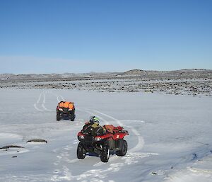 Two quad bikes in the snow at the end of Dingle Rd