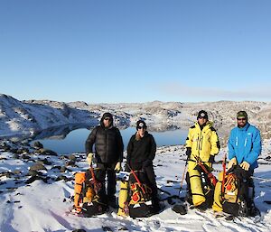 Scott Visser, Jen Proudfoot, Aaron Stanley and Chris Burns in front of Deep Lake
