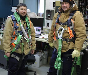 Aaron Stanely and Dave Davies in their safety gear ready to climb the mast to check the anemometer