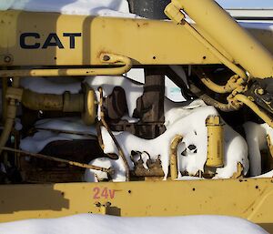 D6 dozer motor beginning to get full of snow while parked up at Davis for the winter