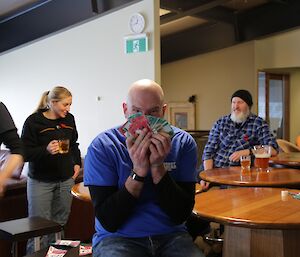 Michael Goldstein with all the Davis dollars after the Two-up game at Davis on ANZAC Day