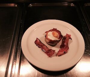 The brunch made by Dr John Parker at Davis — muffins consisting of bread, bacon, cheese, black pudding and an egg put in a muffin tin and baked