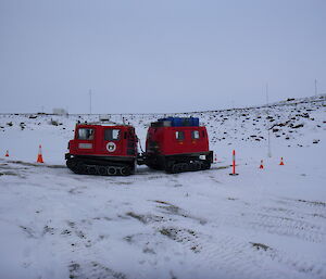 Backing a Hägglunds into a space marked by cones on the beach at Davis for training.