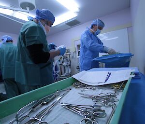 Paul Deverall and Dave Davies check all the instruments are accounted for before and after the procedure during a surgical scenario at Davis