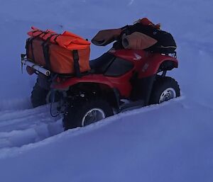 Darren Whites quad bike stuck in deep snow in the tide crack area while attempting to travel onto the sea ice at Davis