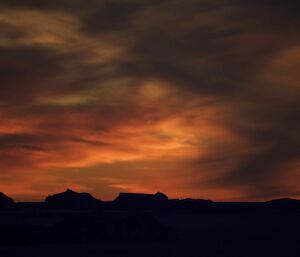 A brilliant orange-red-yellow sunset at Bandits hut recently