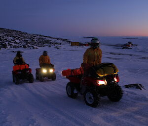 The three quads with Chris Burns, Scott Visser and Jen Proudfoot coming up the hill from the beach at Davis