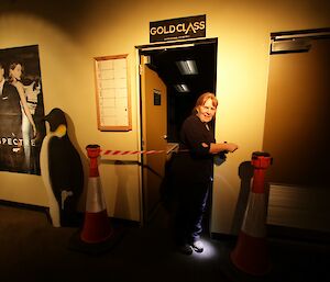 Ali Dean as usher controlling entry to the Davis cinema at a recent movie night