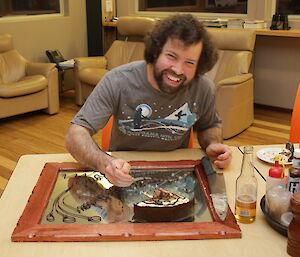 Chris Burns eating his birthday cheesecake