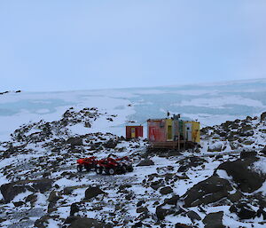 A view of Platcha hut in the Vestfold Hills not far from Davis — quad bikes are parked beside the hut