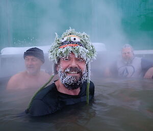 John Parker in the spa with his head and beard encrusted with ice