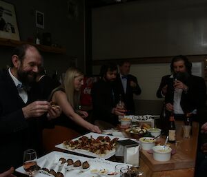 Canapes and champagne start the formal proceedings for Midwinter at Davis