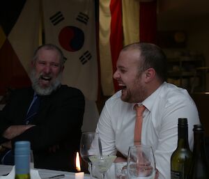 Michael Goldstein and Vas Georgiou laughing at the proceedings for Midwinter at Davis