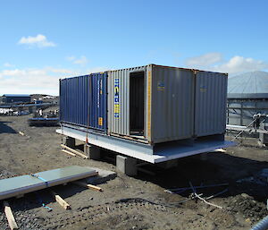 Containers on steel work and sub-floor insulation installed