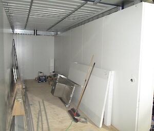 Internal wall linings being installed inside the new Hydroponics building at Davis