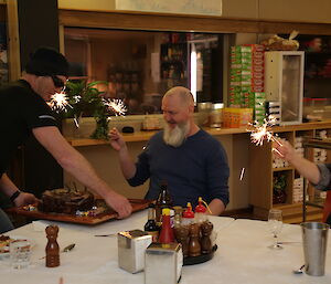 Brett Sambrooks brings Paul Deverall his birthday cake