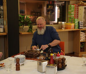 Paul Deverall giving everybody a slice of his cake