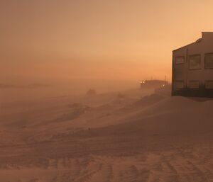 The suns glow shines through the blowing snow at Davis today