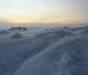 The sun still obscured by blowing snow at Davis today