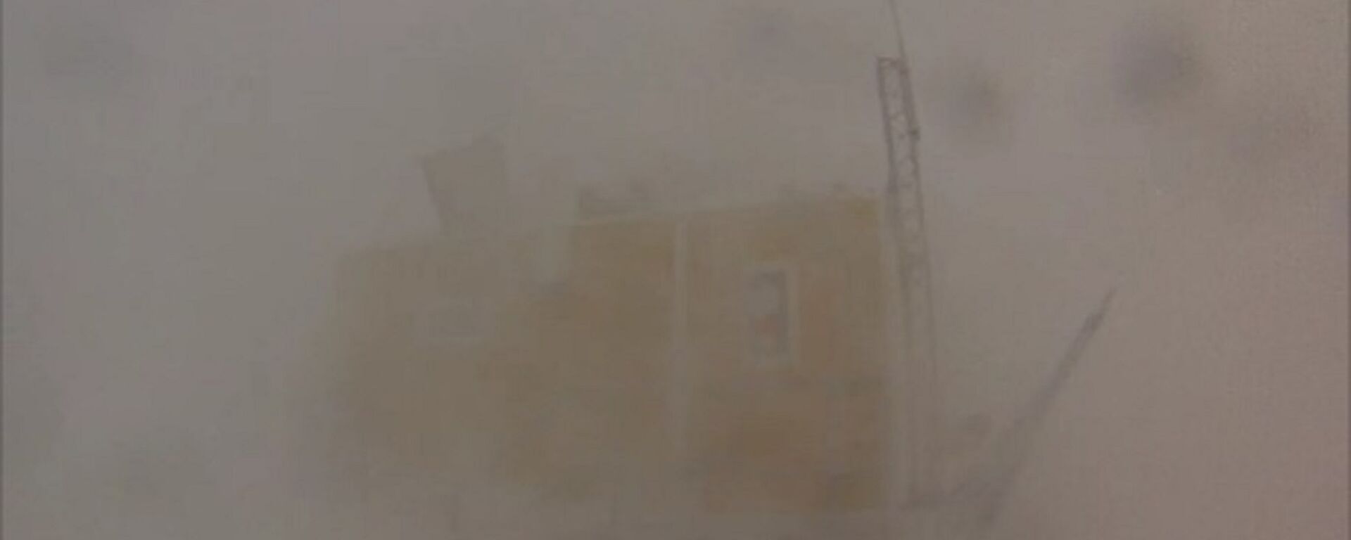 The Sprunky van barely visible through a blizzard up at Woop Woop