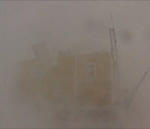 The Sprunky van barely visible through a blizzard up at Woop Woop