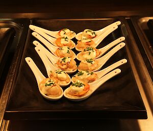 Delicious scallops on a bed of mashed cauliflower
