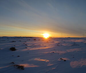 The sun just above the horizon after an absence of eight weeks