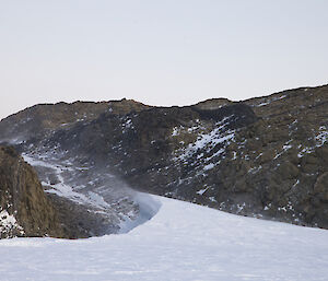 Wind kicking up snow on a wind scour near Platcha hut