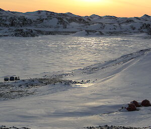 The Marine Plains apples and melon huts with the Hägg in the background near Ellis Fjord