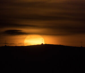 Sun setting behind the Anchorage Island crosses