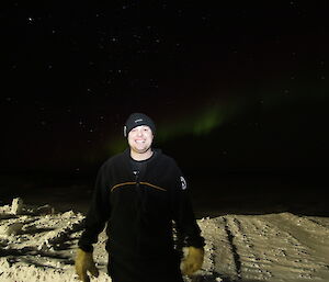 Vas Georgiou with aurora in the background