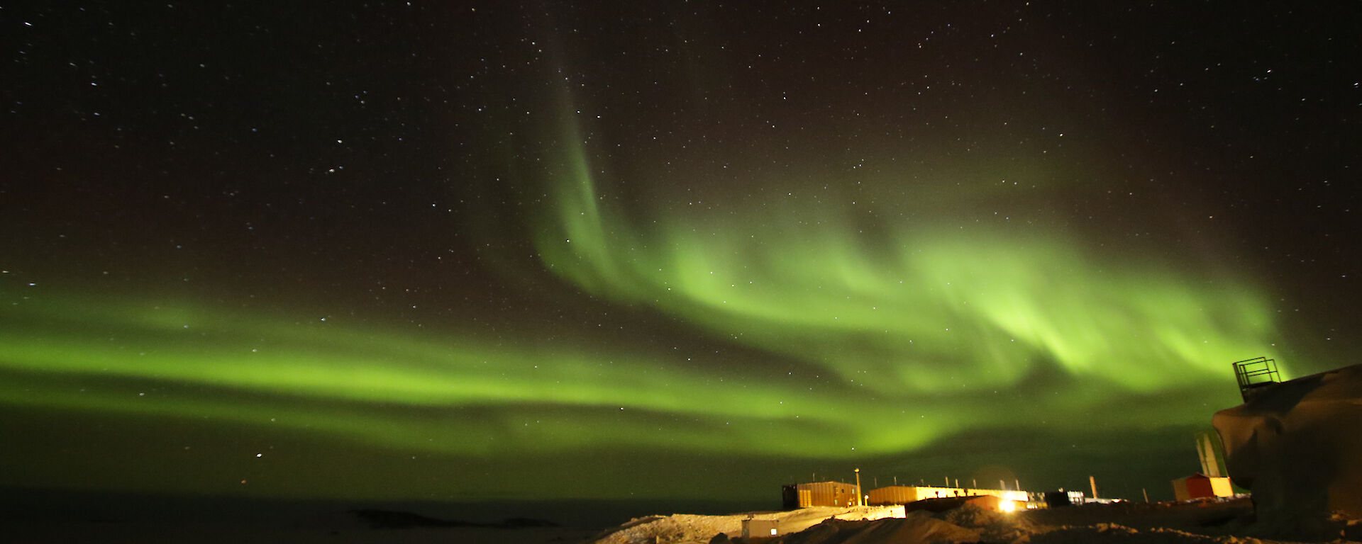 Davis Station with the aurora australis in the skies above on Monday night