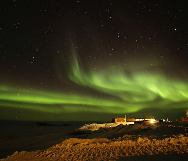 Davis Station with the aurora australis in the skies above on Monday night