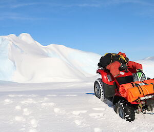 A quad bike in thick snow on the sea ice around Davis