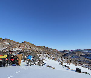 Quad bikes parked at the top of a snowy pass on the way to Trajer Ridge melon