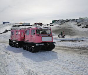 Ali drives Opal into station. They are crossing the tide cracks, leaving the sea ice and coming onto land — whereby Opal officially arrives on station.