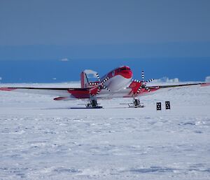 The Basler aircraft, fitted with skis, taking off from the Woop Woop skiway.