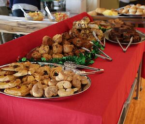 A buffet of freshly made pastries lines the table for Christmas brunch.