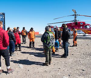 The Chinese team meet our personnel on the helipad: Kirsten (Station Leader), Sharon (Operations Co-ordinator) and Chris (FTO).