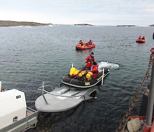 Loading the Zodiacs onto the boat trailers, at the end of the day.