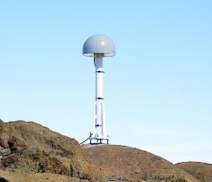 An antenna, installed on a rocky area, surrounded by glaciers. In a very, very remote location!