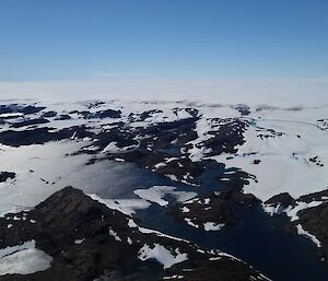 Aerial view of the Vestfold Hills with it’s many lakes, and the Antarctic plateau.