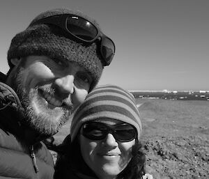 The two met forecasters smile for the camera at the top of The Lookout.