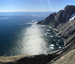 Scullin Monolith: an ampitheatre of rock cliff. It has cliff faces several hundred metres high, soaring straight up from the ocean.