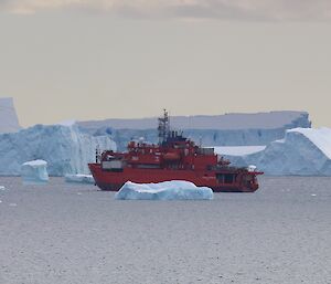 The Aurora is seen sailing past icebergs, heading north, leaving us for the winter and returning expeditioners to Hobart.