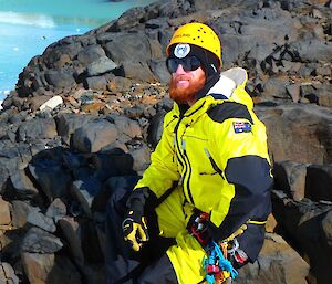 Darren (Shoey) is out in the hills, in his outdoor gear, harnessed up for cravasse rescue training.