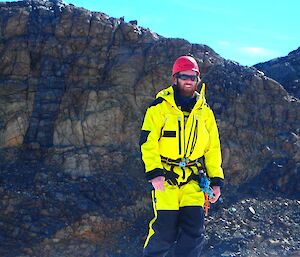 Sharky is wearing his outdoor gear, out in the Vestfold Hills. Also harnessed up for crevasse rescue training.