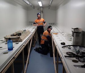 Bryce, and electrician, and Shoey, a plumber, are seen working on the electronics and plumbing systems in the growing channels of the hydroponic chambers. Everything is new and built from scratch.